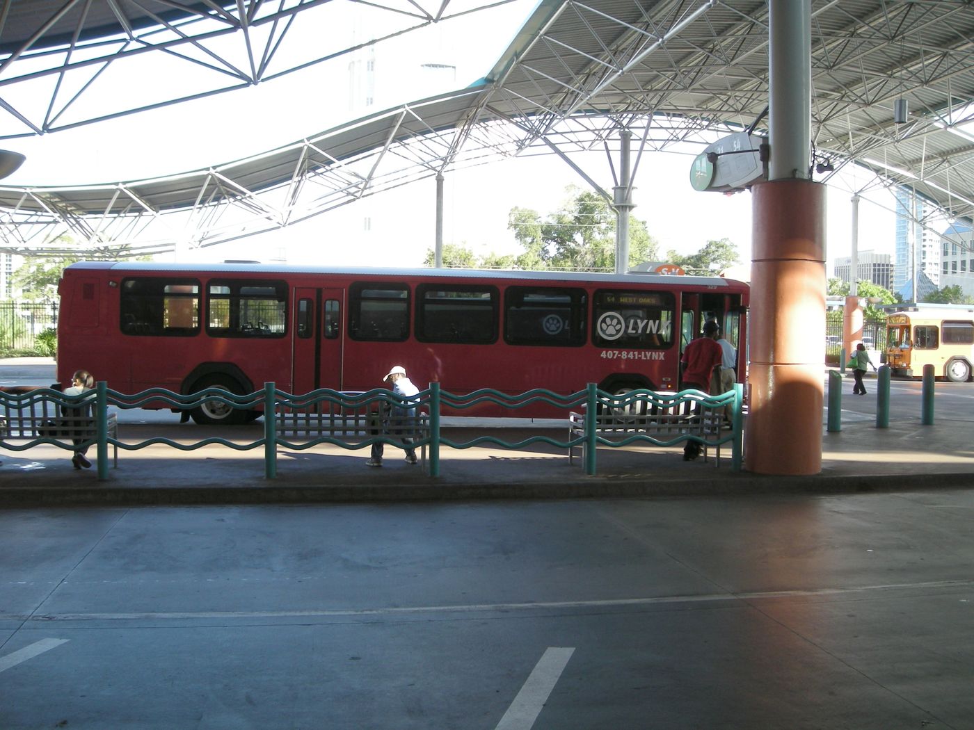 Buses under the canopy at LYNX Central Station in downtown Orlando.